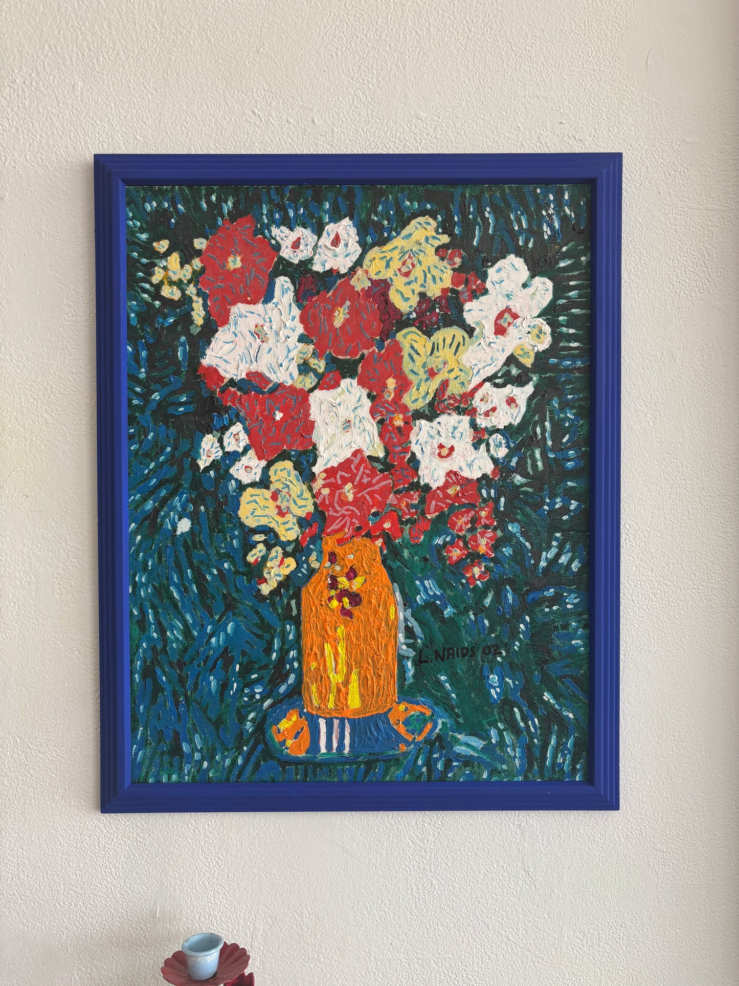 Flowers in blue frame painting